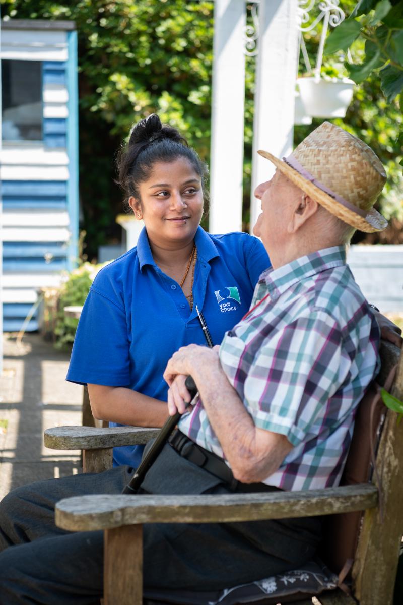 Elderly man with carer