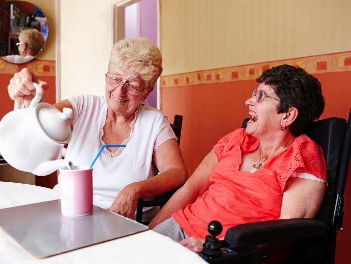 Older women together having tea