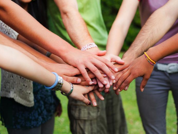 Group hands together