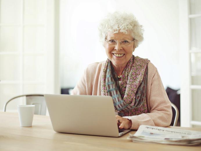 Older woman looking at laptop